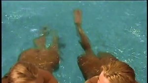 Two Hot Blondes Swim In A Pool And Have A Lesbian Sex