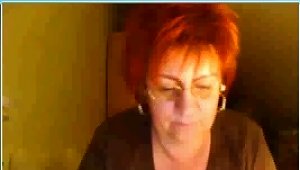 This Red Haired Gran Loves To Give A Web Cam Show