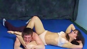 Chick Wrestling With A Guy And Beating Him Up
