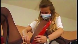Nurse Putting Candles In The Slut's Pussy