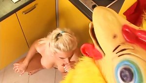 Big Breasted Blonde Sucking A Chicken's Big Dick