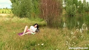 Teen Beauty In The Grass Is Alone And Free To Masturbate