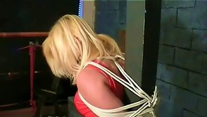 Sexy Blonde Wearing Latex Clothes And High Heels Gets Bound