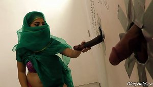 Muslim Bitch Sucking Cocks At A Gloryhole And Receives A Facial